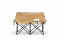 Tan khaki double camping loveseat chair with black steel frame, straw hat on seat, white background, no props